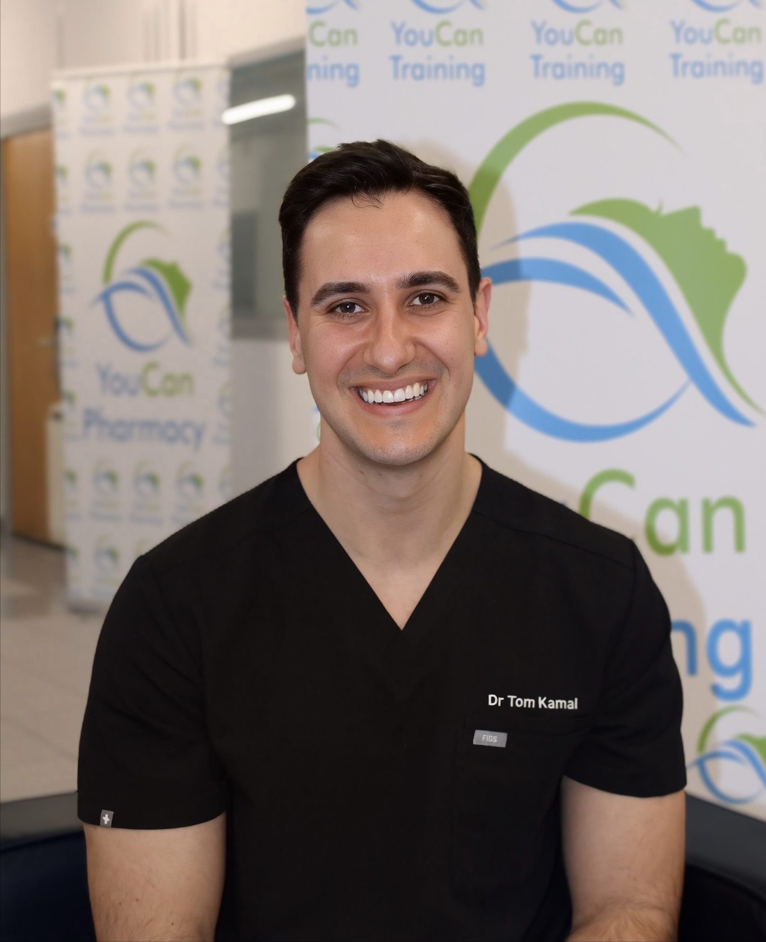 Dr Tom Kamal
